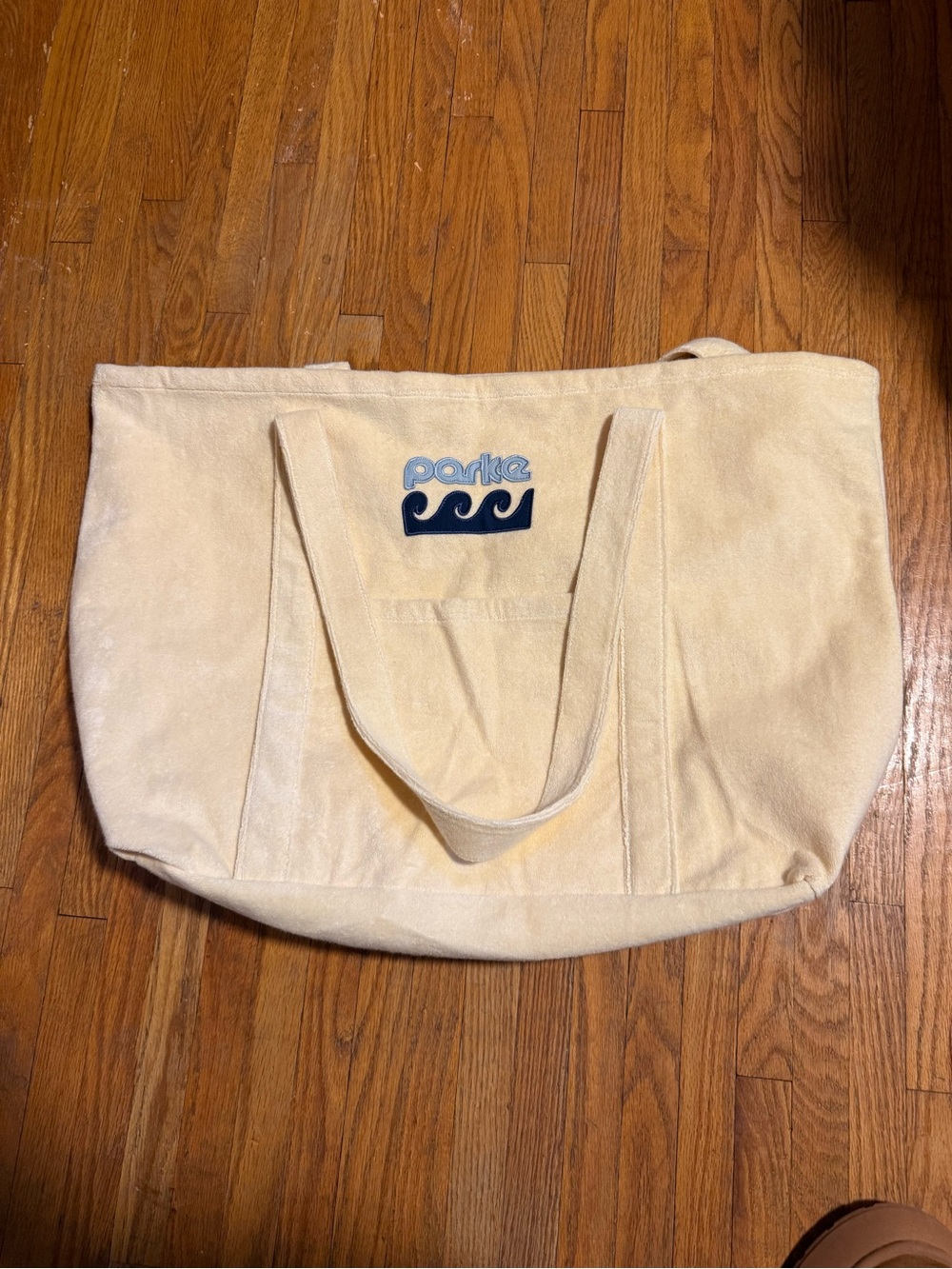 Parke Canvas Tote Bag in Cream with Navy Logo. Sold out